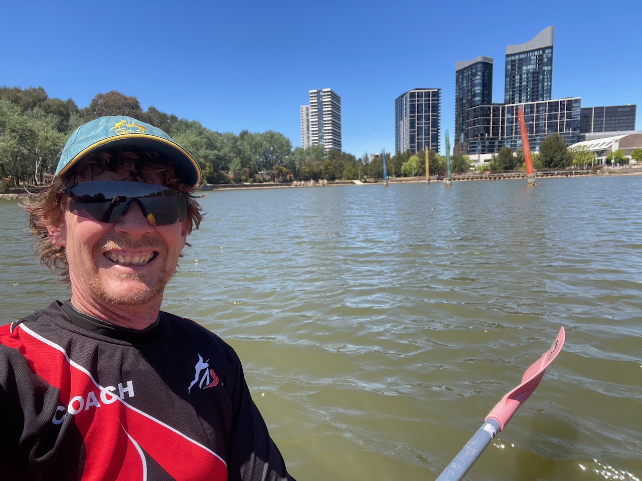 Canberra Sprint Coach, Steve Dodt, paddling in a recovery session on Lake Ginninderra